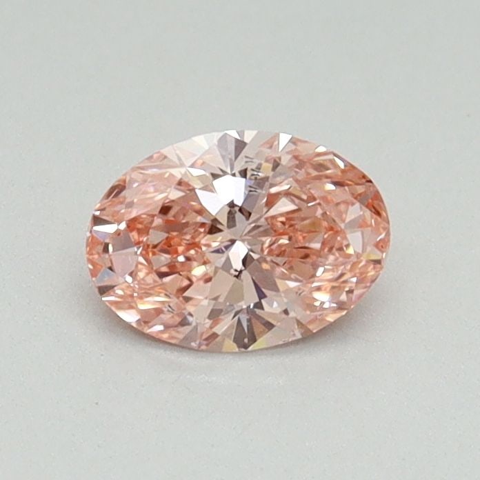 Loose Diamond - OVAL 0.41ct Fancy Vivid Pink SI1: Loose Diamond - OVAL 0.41ct Fancy Vivid Pink SI1 Source: This is a real non-mined Diamond that has been grown in a lab Shape: OVAL Carats: 0.41 Color: Fancy Vivid Pink Certification: IGI Video: