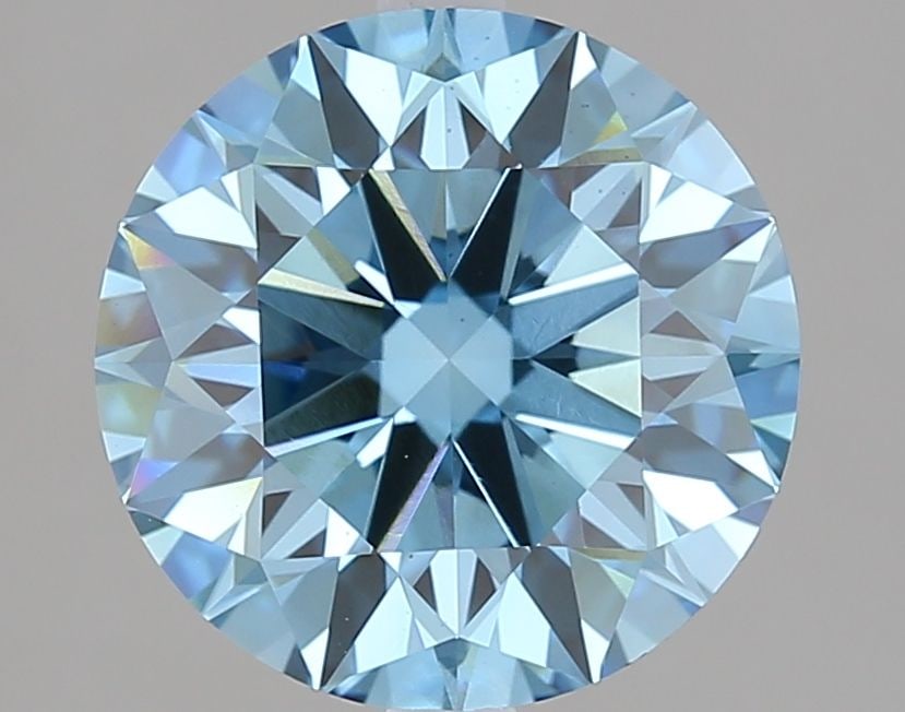 Ideal Loose Diamond - ROUND 3.06ct Fancy Vivid Blue VS2: Ideal Loose Diamond - ROUND 3.06ct Fancy Vivid Blue VS2 Source: This is a real non-mined Diamond that has been grown in a lab Shape: ROUND Carats: 3.06 Color: Fancy Vivid Blue Certification: IGI Video