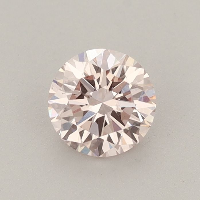 Loose Diamond - ROUND 0.62ct Fancy Light Pink VS2: Loose Diamond - ROUND 0.62ct Fancy Light Pink VS2 Source: This is a real non-mined Diamond that has been grown in a lab Shape: ROUND Carats: 0.62 Color: Fancy Light Pink Certification: IGI Video: