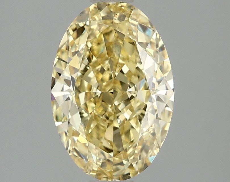 Loose Diamond - OVAL 2.08ct Fancy Intense Yellow VS2: Loose Diamond - OVAL 2.08ct Fancy Intense Yellow VS2 Source: This is a real non-mined Diamond that has been grown in a lab Shape: OVAL Carats: 2.08 Color: Fancy Intense Yellow Certification: IGI