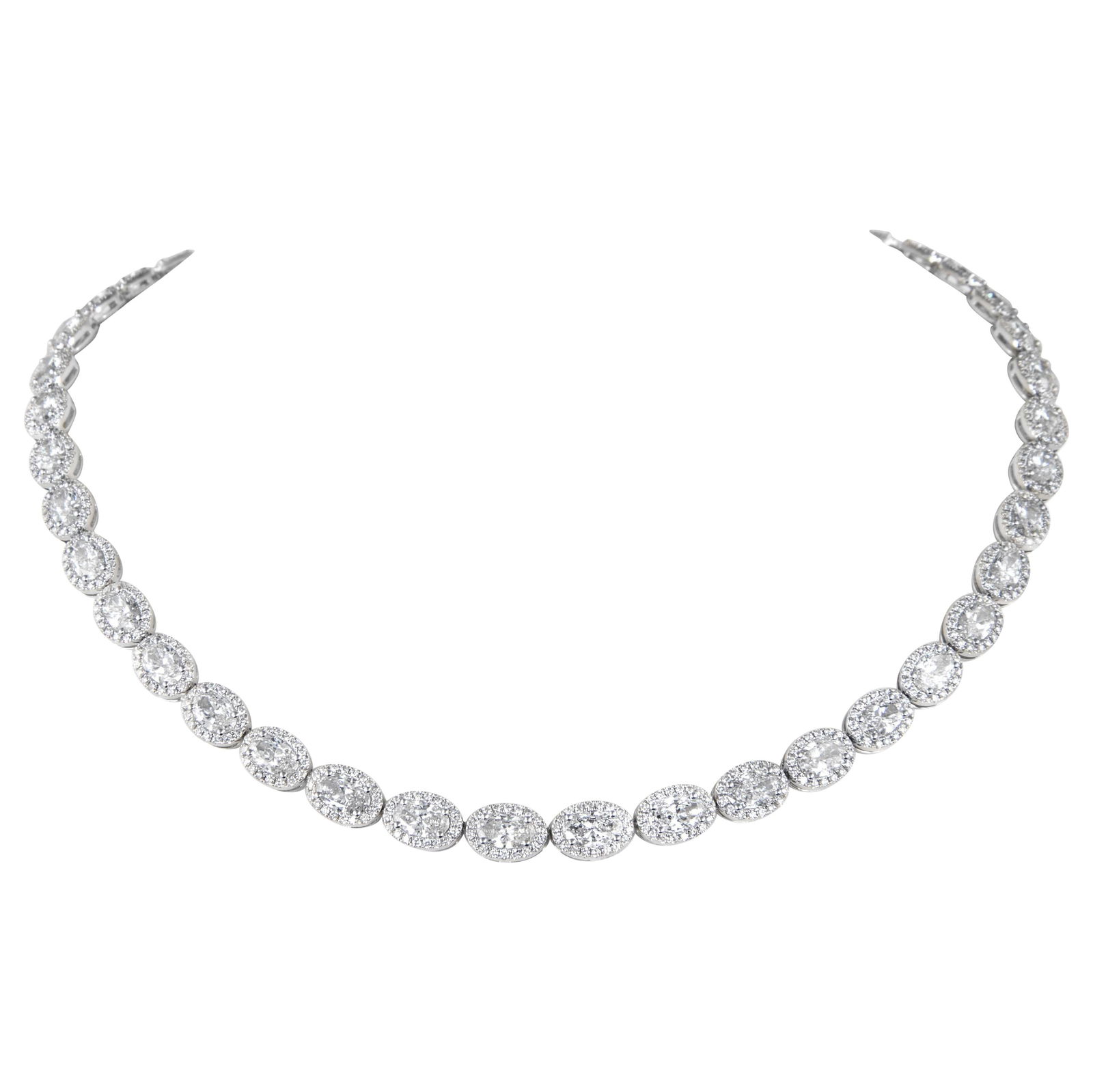 22.18ct Oval Diamond Tennis Necklace 18k White Gold: 22.18ct Oval Diamond Tennis Necklace 18k White Gold This exquisite 22.18ct Oval Diamond Tennis Necklace with Halo is a stunning piece of high jewelry. Crafted from 18k white gold, it features a contem