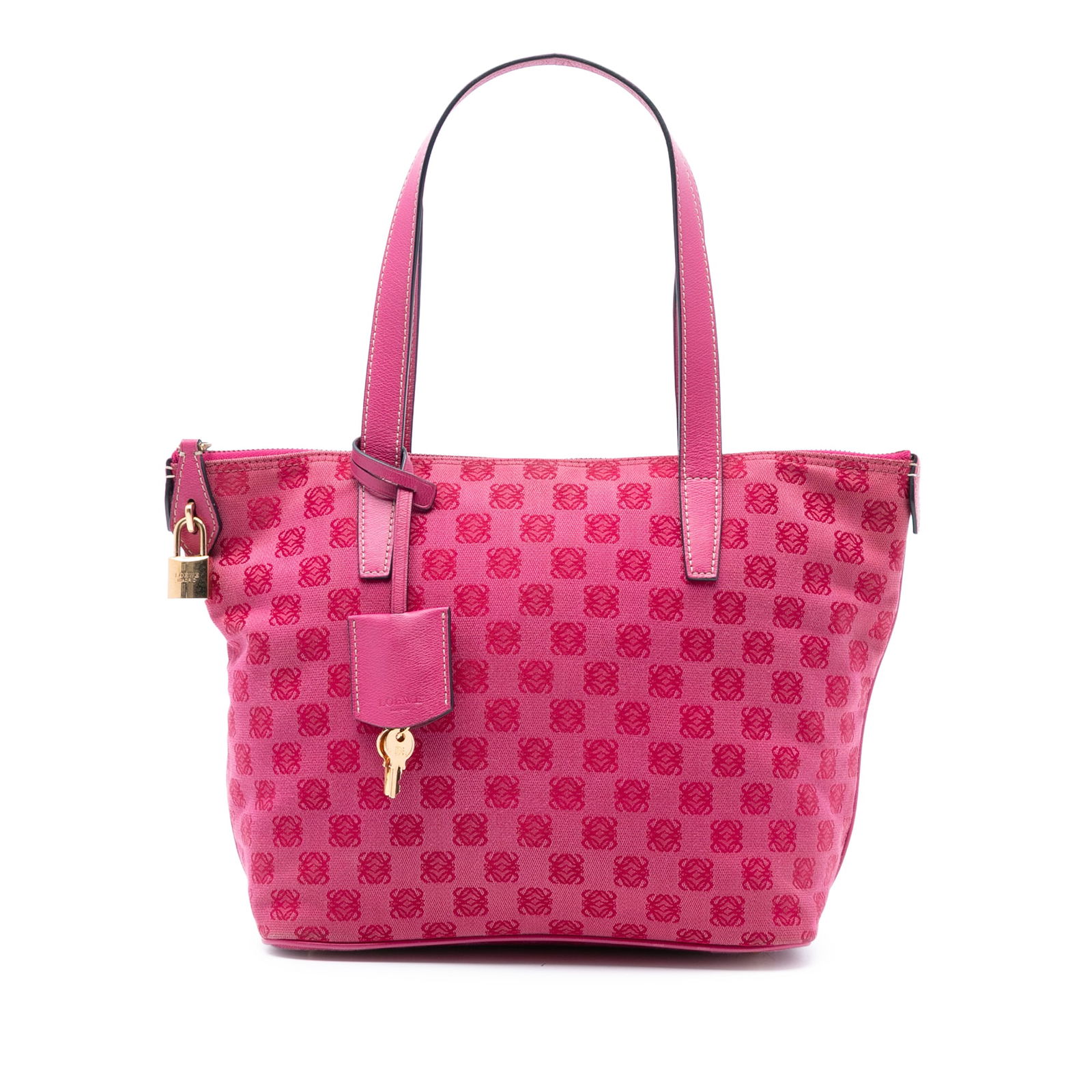 LOEWE Pink Anagram Canvas Tote Bag with Leather Trim: LOEWE Pink Anagram Canvas Tote Bag with Leather Trim The LOEWE Anagram Canvas Tote is a stylish and functional accessory crafted from durable canvas with elegant leather trim. This tote features flat