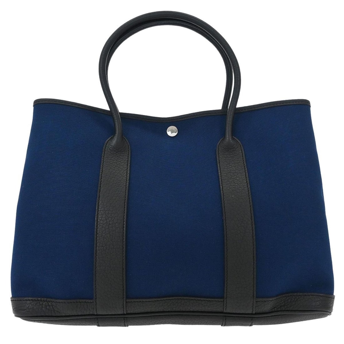 Hermes Navy Toile Officier Garden Party 36 PM Tote Bag: Hermes Navy Toile Officier Garden Party 36 PM Tote Bag Introducing the exquisite Hermes Navy Toile Officier Negonda Garden Party 36 PM Tote Bag, a perfect blend of elegance and practicality. This spac