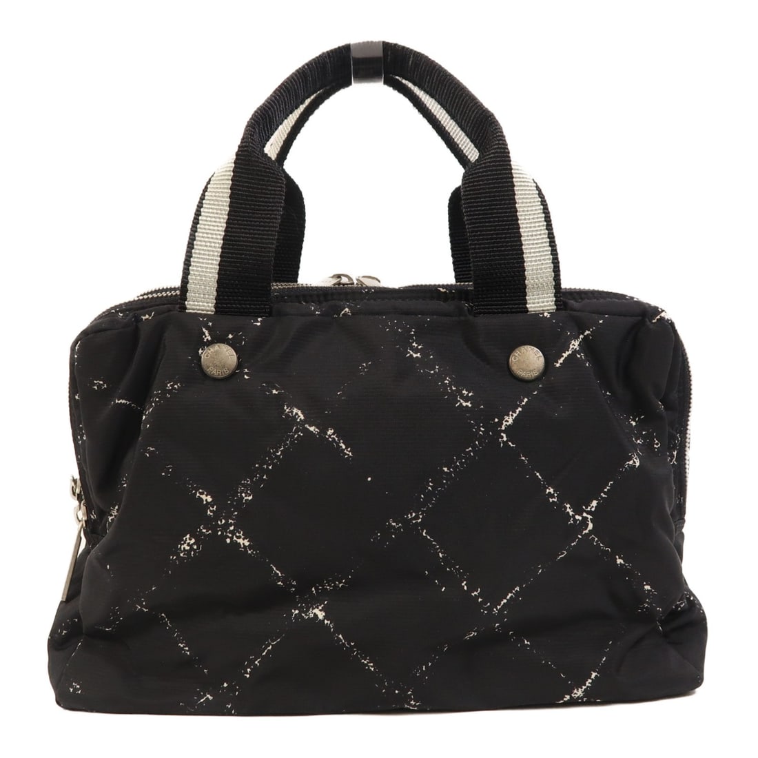 Black Nylon Travel Line Handbag by CHANEL with Silver Tone CC: Black Nylon Travel Line Handbag by CHANEL with Silver Tone CC This Chanel Travel Line handbag features a sleek black nylon exterior and a classic silhouette. Designed for both style and practicality,