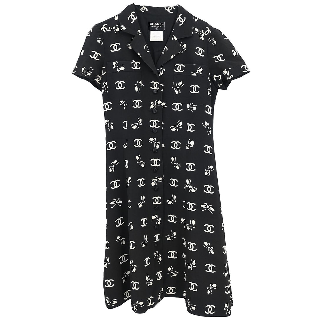 Chanel Vintage Black Midi Dress 50% Silk 50% Acetate Size 38: Chanel Vintage Black Midi Dress 50% Silk 50% Acetate Size 38 This vintage Chanel short sleeve dress is perfect for casual summer outings. Crafted from a luxurious blend of 50% acetate and 50% silk, it