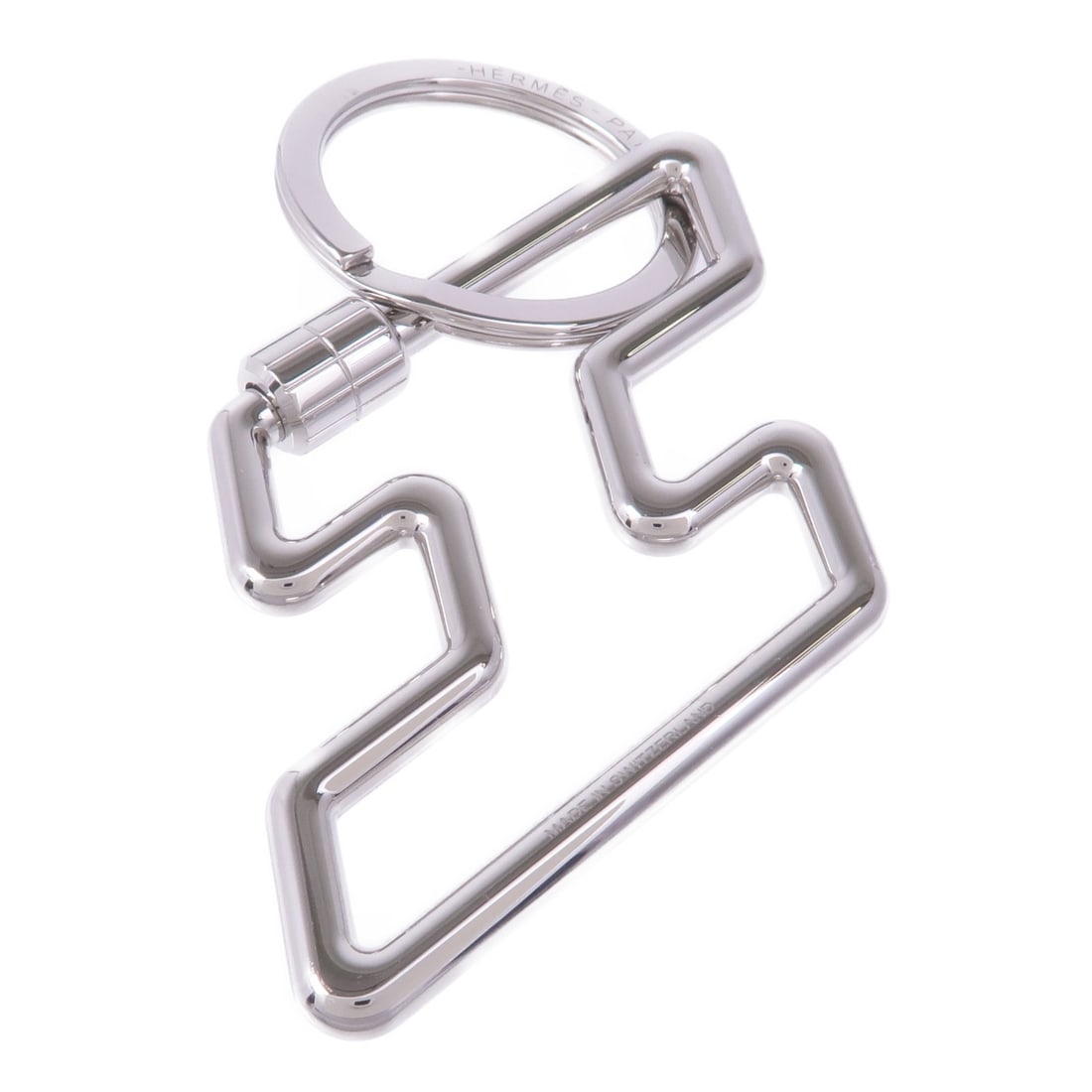 HERMES H Too Silver Metal Key Ring France: HERMES H Too Silver Metal Key Ring France Introducing a sleek and sophisticated key ring from HERMES, crafted in a stunning silver finish. This stylish accessory is perfect for keeping your keys organ