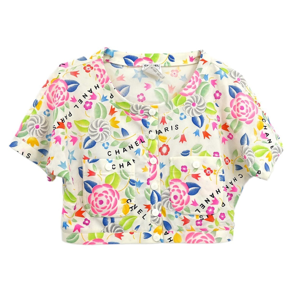 Vintage Chanel Cropped White T-Shirt 96P Size 42: Vintage Chanel Cropped White T-Shirt 96P Size 42 Elevate your casual wardrobe with this vintage Chanel cropped t-shirt, a perfect blend of comfort and style. This classic piece features a round neckli