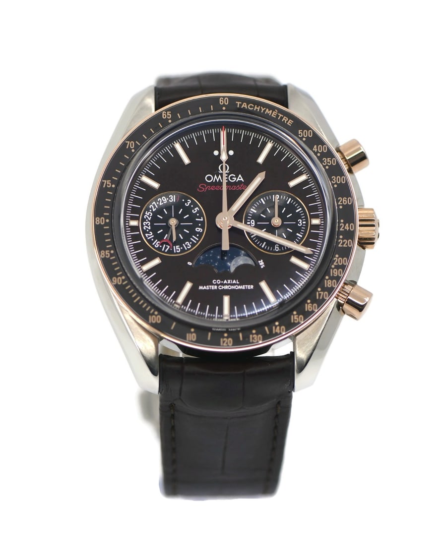 OMEGA Speedmaster Moonphase 18K Stainless Steel Watch 304.23.44.52.13.001 with Box and Papers: OMEGA Speedmaster Moonphase 18K Stainless Steel Watch 304.23.44.52.13.001 with Box and Papers Experience the elegance of the Omega Speedmaster Moonphase, a stunning wristwatch crafted with a blend of