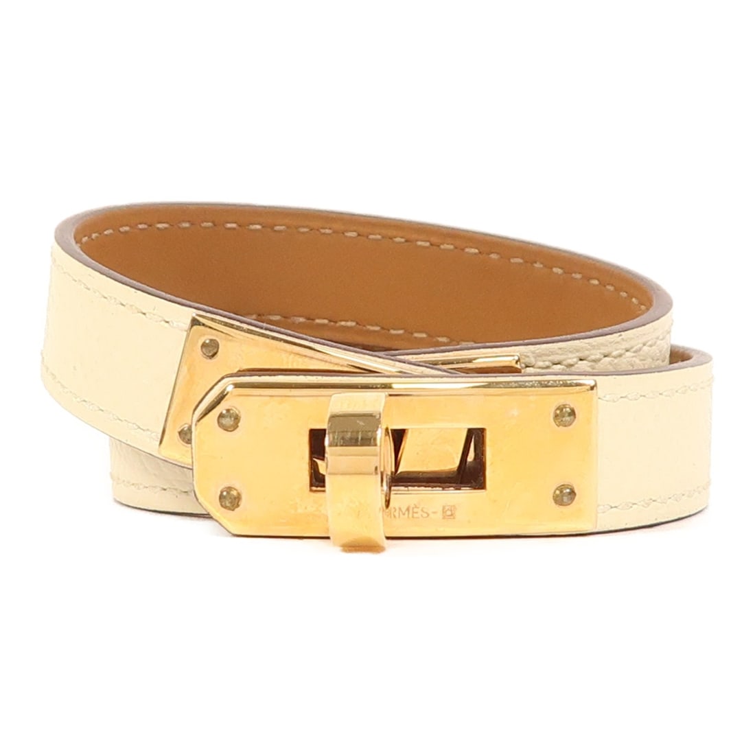 HERMES Kelly Double Tour T1 White Epsom Leather Bangle: HERMES Kelly Double Tour T1 White Epsom Leather Bangle This exquisite HERMES Kelly Double Tour T1 Bracelet is crafted from high-quality Epsom leather in a stunning white hue, making it a versatile acc