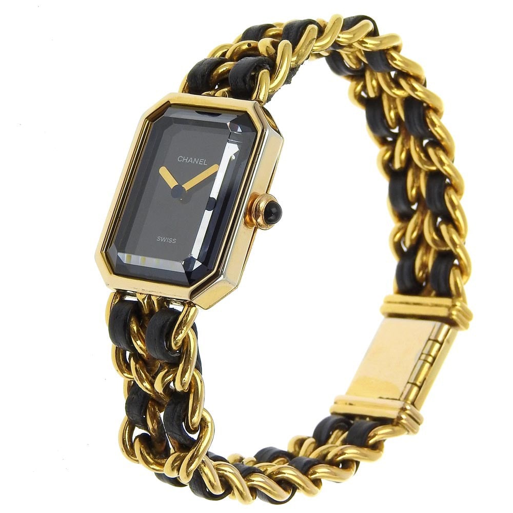 Premiere Rock Women's Quartz Timepiece by Chanel: Premiere Rock Women's Quartz Timepiece by Chanel Chanel Premiere Rock Quartz Watch designed for women. The watch features a body and belt with fine scratches, plating peeling, and signs of wear such a