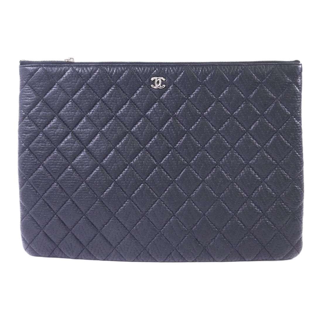Chanel Black Lambskin Leather CC Silver Clutch Pouch: Chanel Black Lambskin Leather CC Silver Clutch Pouch This CHANEL clutch bag features luxurious black lambskin leather and a sleek silver-tone CC logo. Designed as a pouch-style clutch, it offers a sop