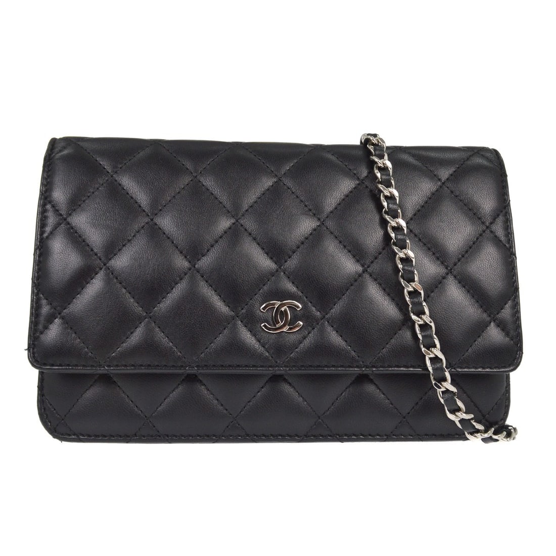 Black Leather Chanel Wallet on Chain WOC Bag: Black Leather Chanel Wallet on Chain WOC Bag This Chanel Wallet on Chain (WOC) bag features luxurious black lambskin leather in a folding design. Made in Italy, it offers a sleek and versatile accesso