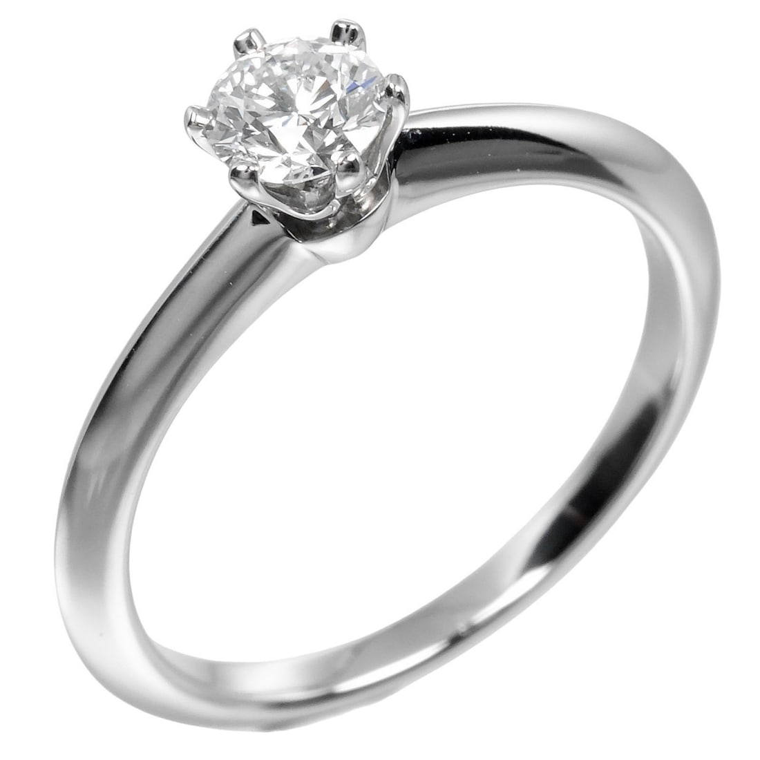 Solitaire Ring Tiffany Setting by Tiffany & Co.: Solitaire Ring Tiffany Setting by Tiffany & Co. This Tiffany & Co. Tiffany Setting Solitaire Ring is designed for women and showcases the classic elegance of the iconic solitaire style. The ring is a