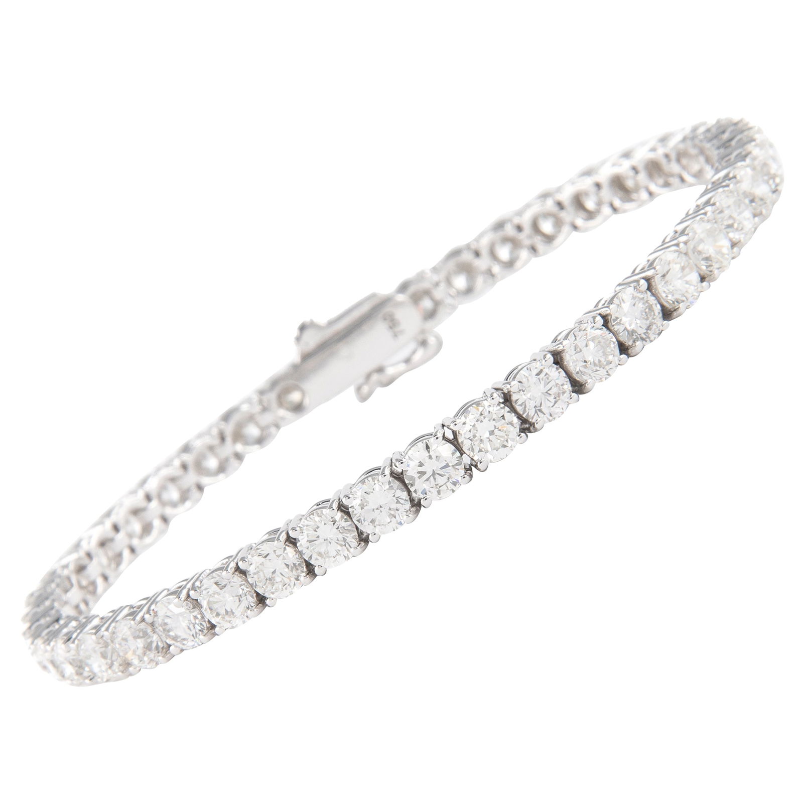 9.88ct Diamond Tennis Bracelet 18k White Gold: 9.88ct Diamond Tennis Bracelet 18k White Gold This exquisite 9.88ct Diamond Tennis Bracelet is crafted from luxurious 18k white gold, featuring 42 round brilliant diamonds totaling 9.88 carats. The di