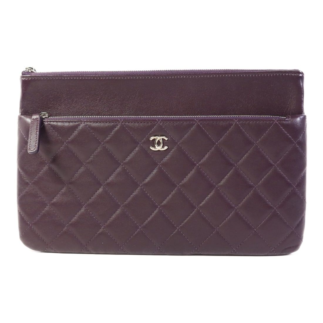 CHANEL Double Zip Pouch Lambskin Leather Purple SHW: CHANEL Double Zip Pouch Lambskin Leather Purple SHW This elegant CHANEL double zip pouch is crafted from luxurious purple lambskin leather, showcasing a sophisticated exterior. The pouch features a sl