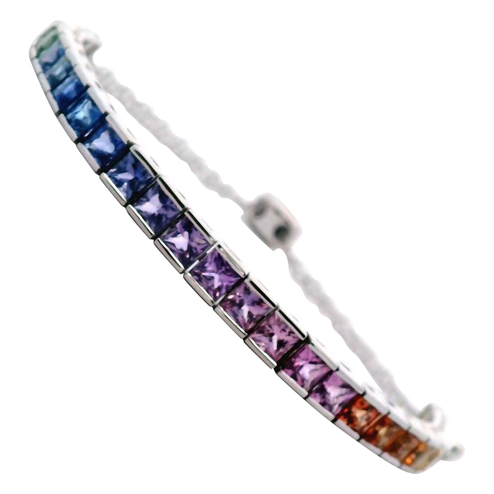 6.06ct Rainbow Sapphire Bracelet in 14k White Gold: 6.06ct Rainbow Sapphire Bracelet in 14k White Gold This stunning adjustable bracelet features a remarkable 6.06ct total weight of rainbow sapphires, elegantly set in 14k white gold. The design showcas