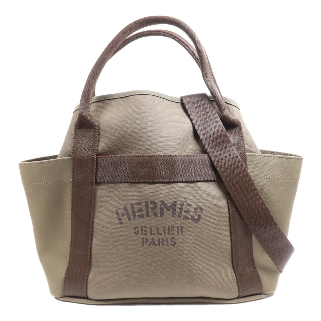 HERMES Sac De Pansage 2 Way Shoulder Bag Green Canvas: HERMES Sac De Pansage 2 Way Shoulder Bag Green Canvas Introducing the HERMES PHW Sac De Pansage Groom 2 Way Shoulder Bag, a stylish and versatile accessory crafted from durable canvas in a rich green