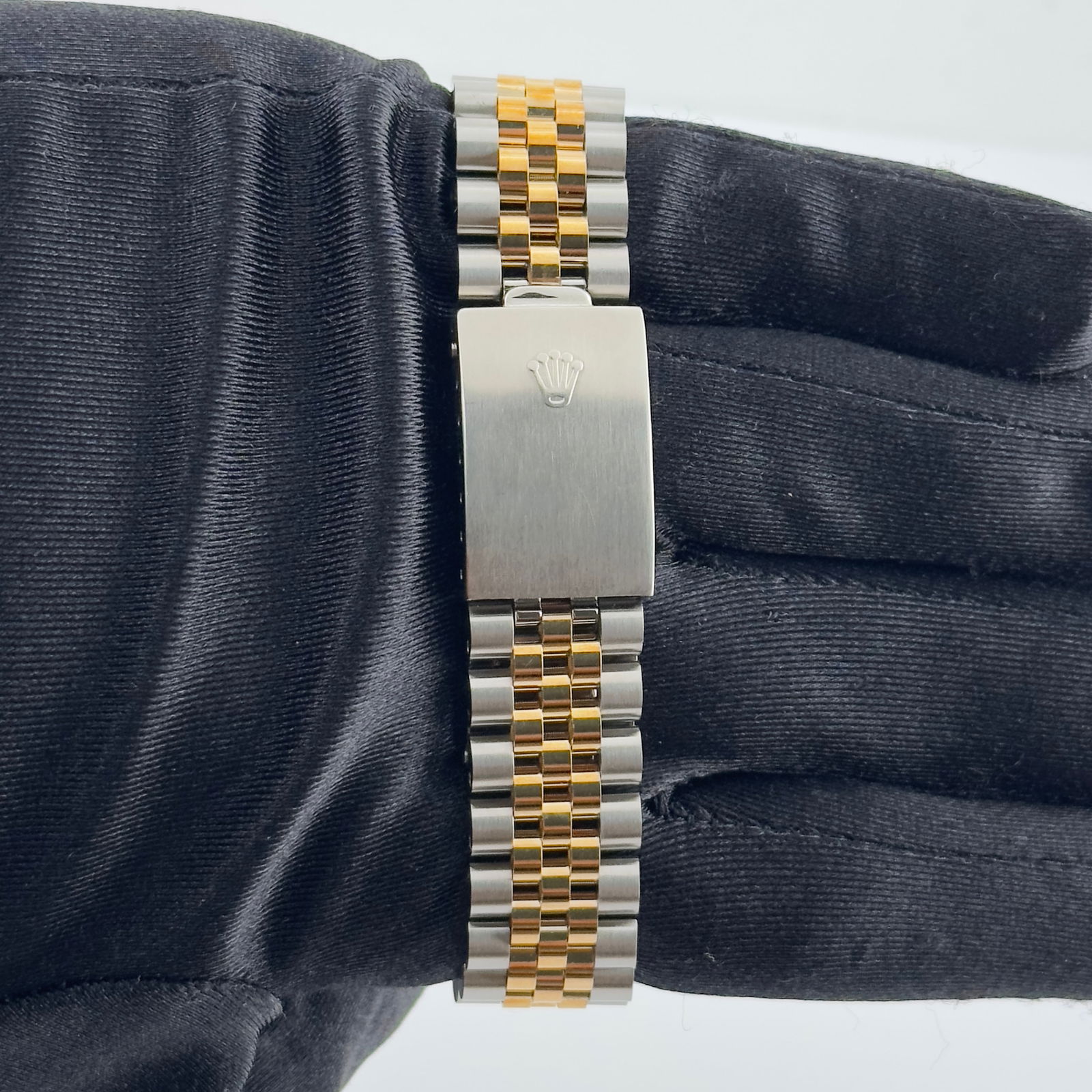 Unisex Rolex Ref 6694 Aftermarket Black Diamond Dial Jubilee Bracelet Watch: Unisex Rolex Ref 6694 Aftermarket Black Diamond Dial Jubilee Bracelet Watch This Rolex Oyster Perpetual Date watch features an Aftermarket black diamond dial and an Aftermarket Jubilee bracelet. The t