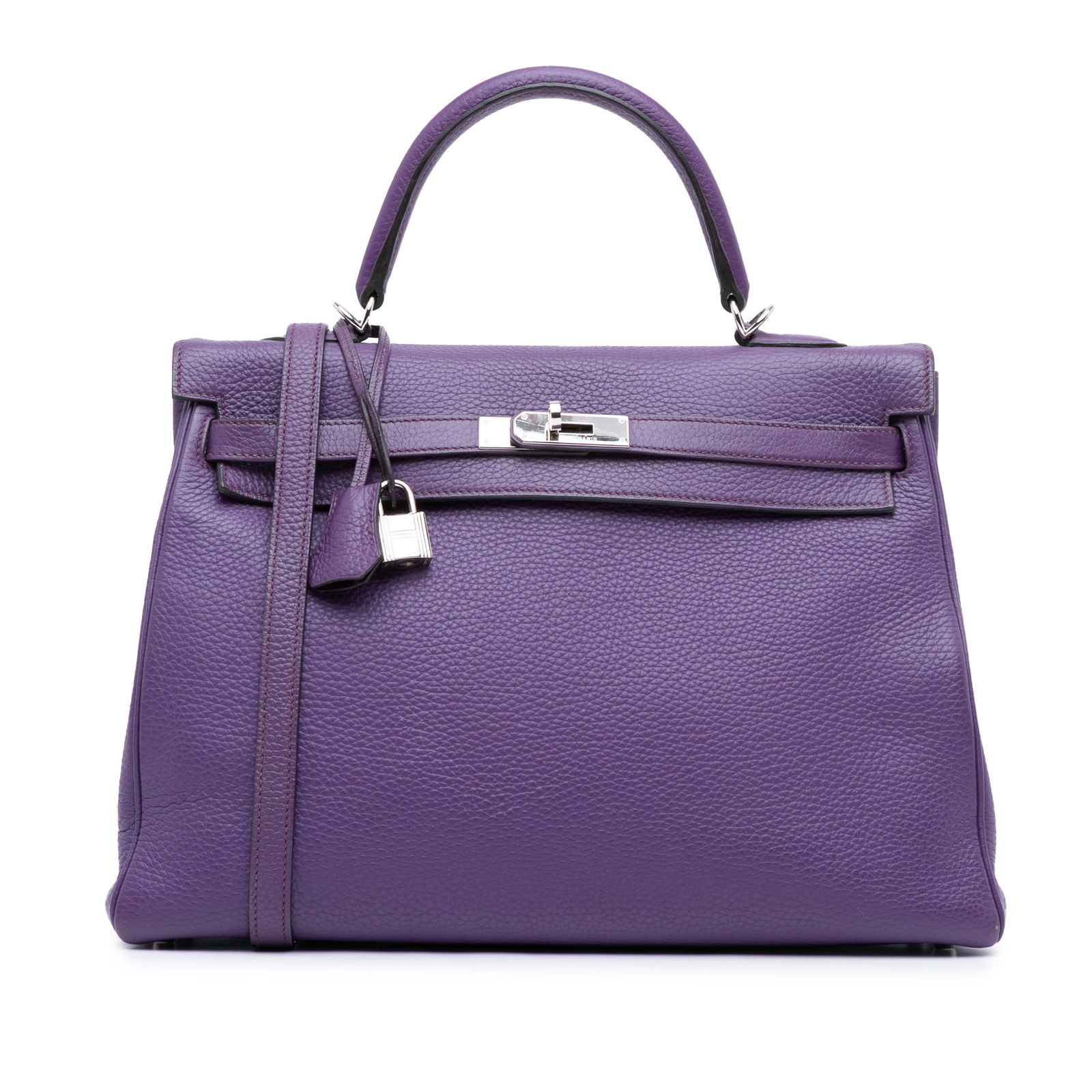 Hermes Togo Kelly II Retourne 35 Ultraviolet Leather Handbag: Hermes Togo Kelly II Retourne 35 Ultraviolet Leather Handbag The Hermes Togo Kelly II Retourne 35 is a luxurious handbag crafted from Togo leather in a vibrant Ultraviolet color. It features a flat le