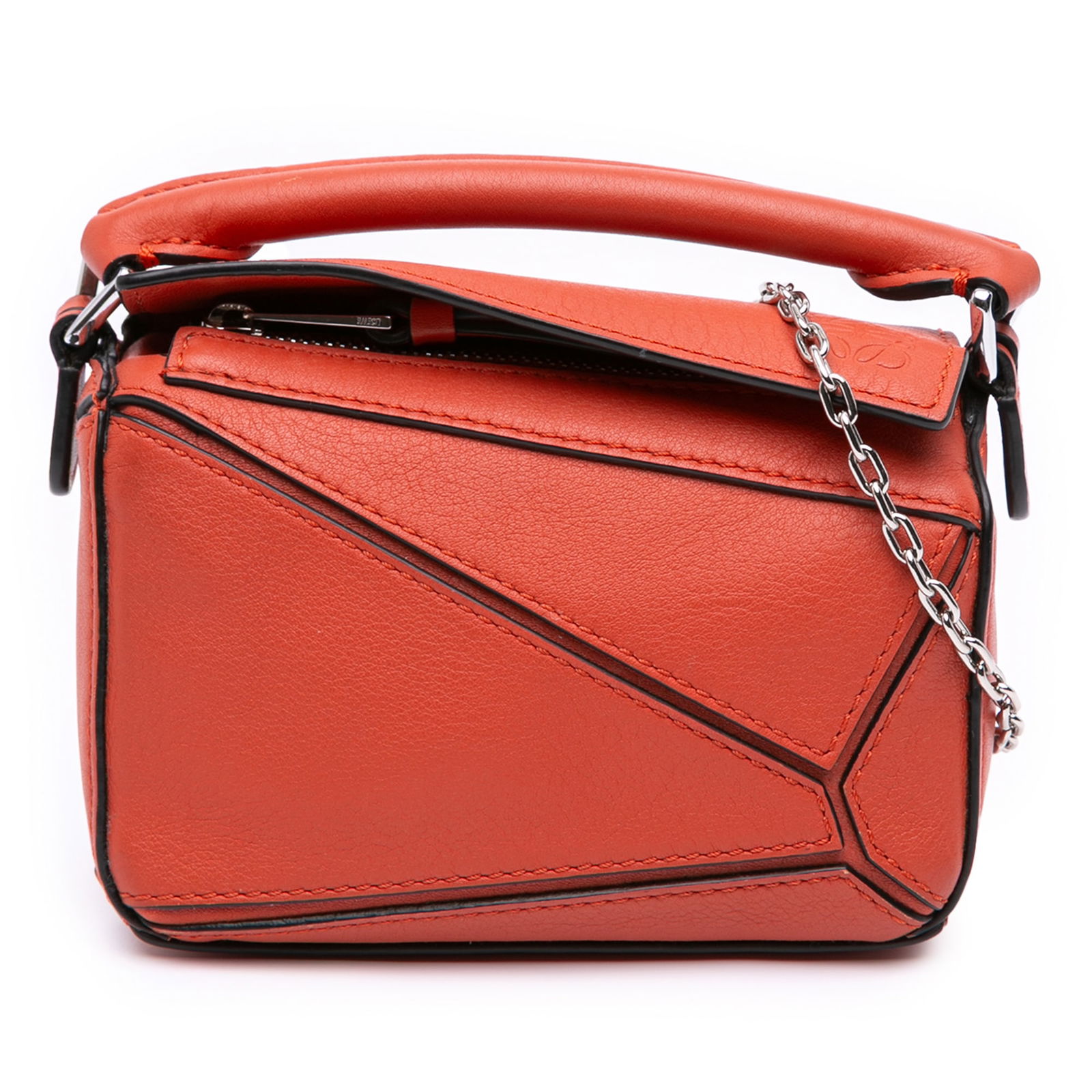 LOEWE Nano Puzzle Satchel Orange Leather with Chain Strap: LOEWE Nano Puzzle Satchel Orange Leather with Chain Strap Introducing the LOEWE Nano Calfskin Puzzle Satchel, an elegant accessory that showcases a vibrant orange leather body. This chic satchel featu