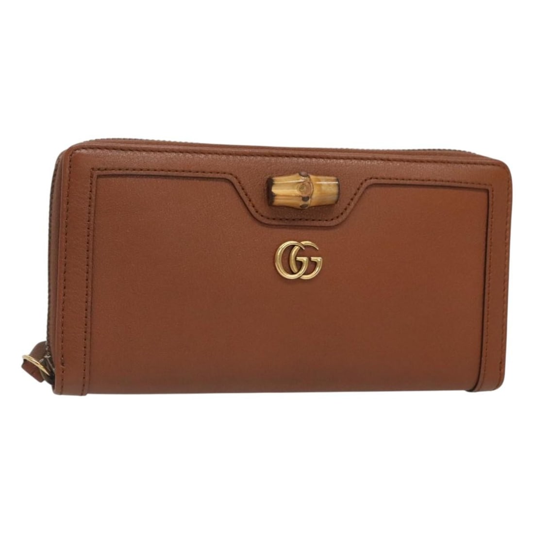 Brown Diana Zip Wallet by Gucci with Zipper Closure: Brown Diana Zip Wallet by Gucci with Zipper Closure This Gucci Diana zip around wallet features a brown exterior and is designed for female users. The wallet is pre-owned and remains in excellent cond