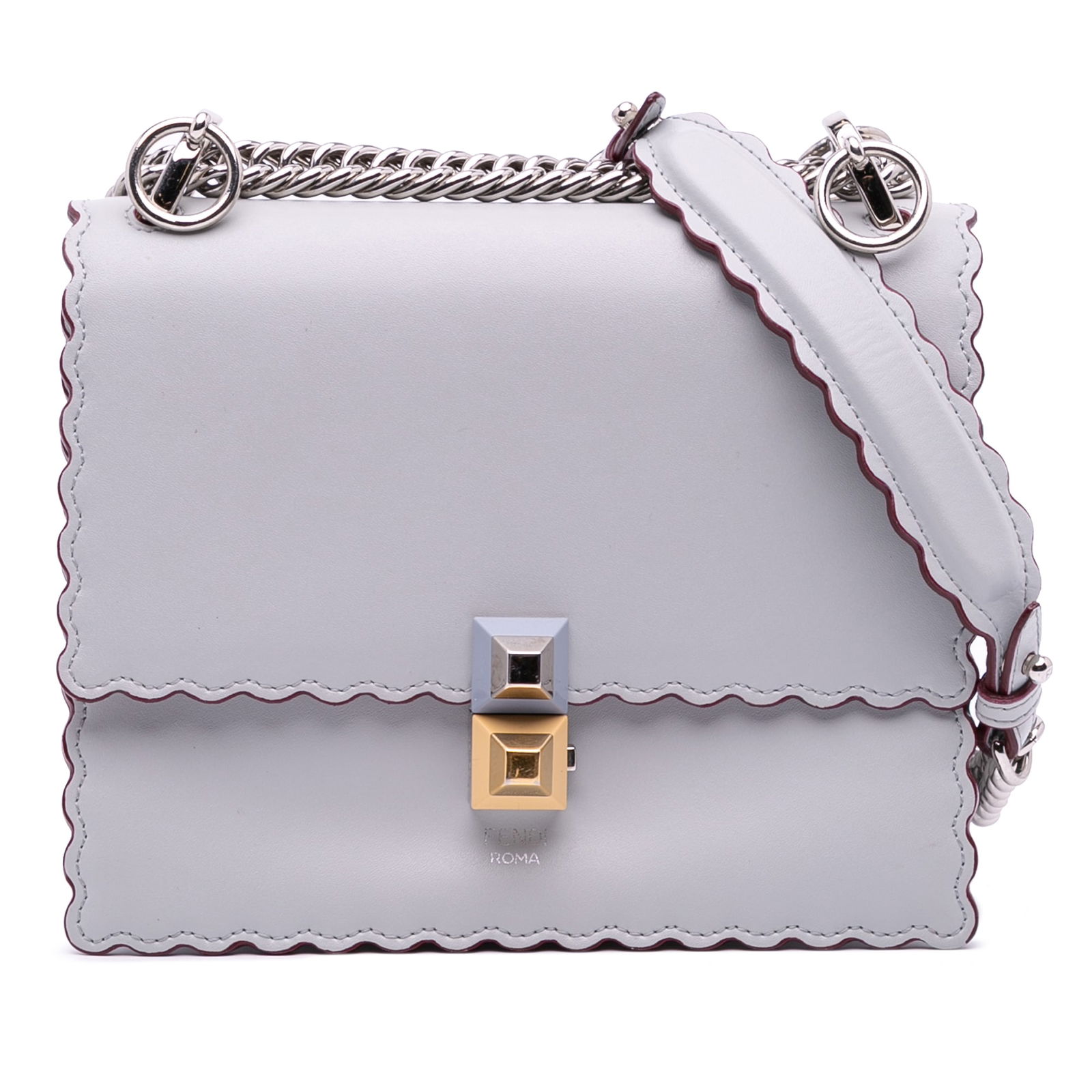 Fendi Small Leather Studded Scalloped Kan I Bag Purple: Fendi Small Leather Studded Scalloped Kan I Bag Purple The Fendi Small Leather Studded Scalloped Kan I bag is a stylish accessory that showcases a vibrant purple leather body. It features a curb chain