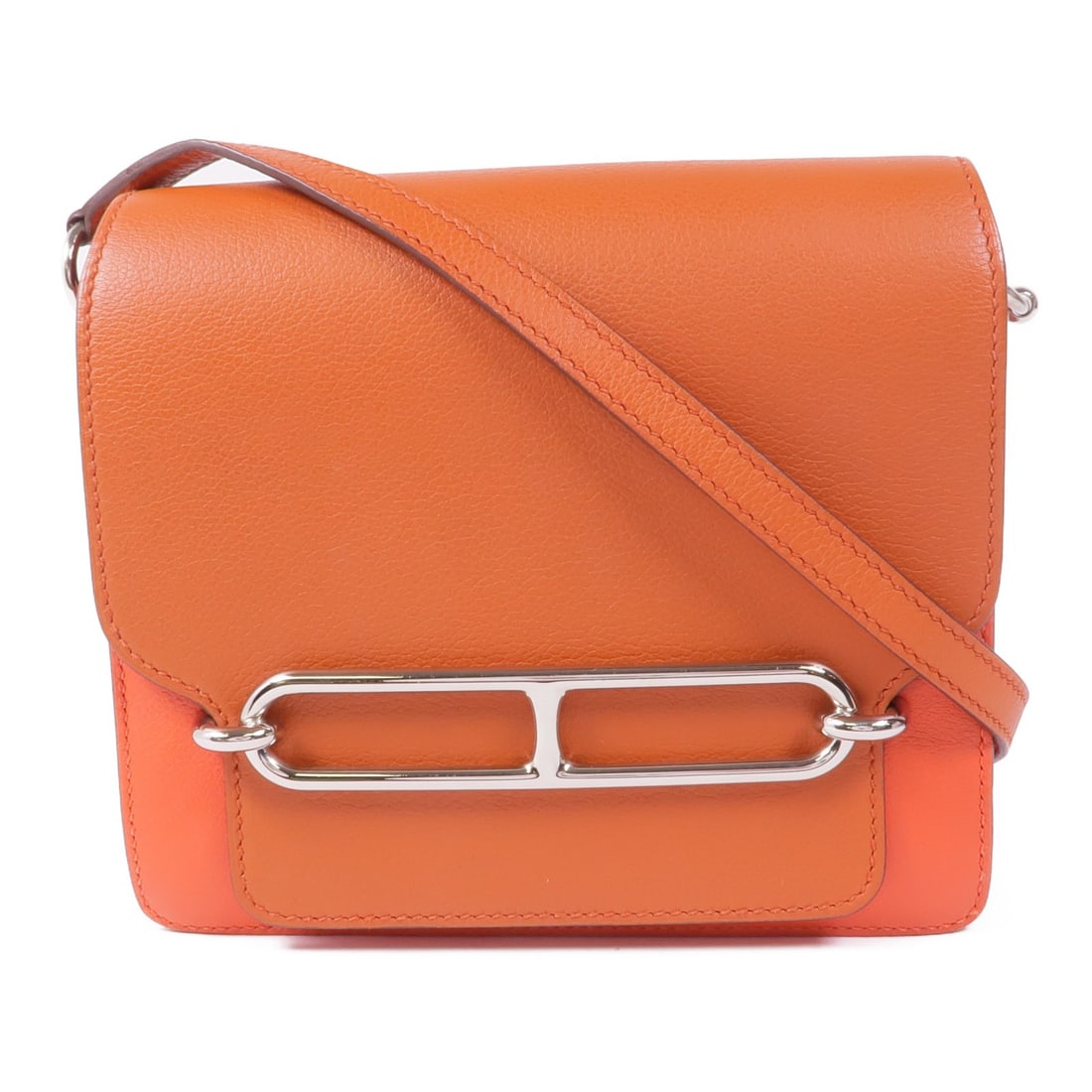 HERMES Roulis Mini Shoulder Bag Evercolor Leather Capucine Terre Battu: HERMES Roulis Mini Shoulder Bag Evercolor Leather Capucine Terre Battu Presenting the HERMES Roulis Mini Shoulder Bag, expertly crafted from luxurious Evercolor leather. This stylish shoulder bag feat