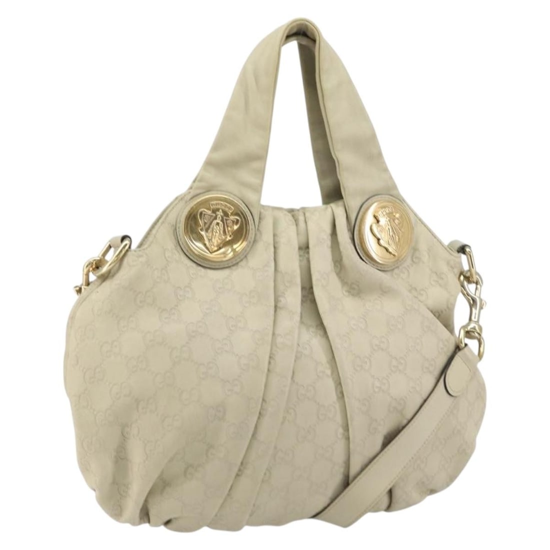 Beige Hysteria Convertible Handbag by Gucci with Top Handles: Beige Hysteria Convertible Handbag by Gucci with Top Handles This pre-owned Gucci Hysteria Convertible Top Handle Bag in beige shows significant signs of wear, including loss of shape, surface rubbing