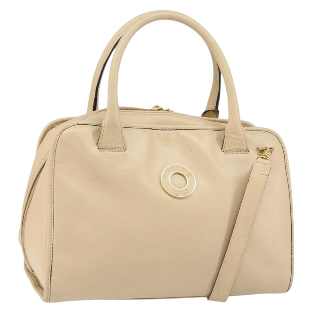 Beige Celine Handbag with Circle Logo Design: Beige Celine Handbag with Circle Logo Design This pre-owned Celine Circle Logo handbag in beige features a classic design with noticeable signs of use, including surface rubbing, minor dirt, and a sto