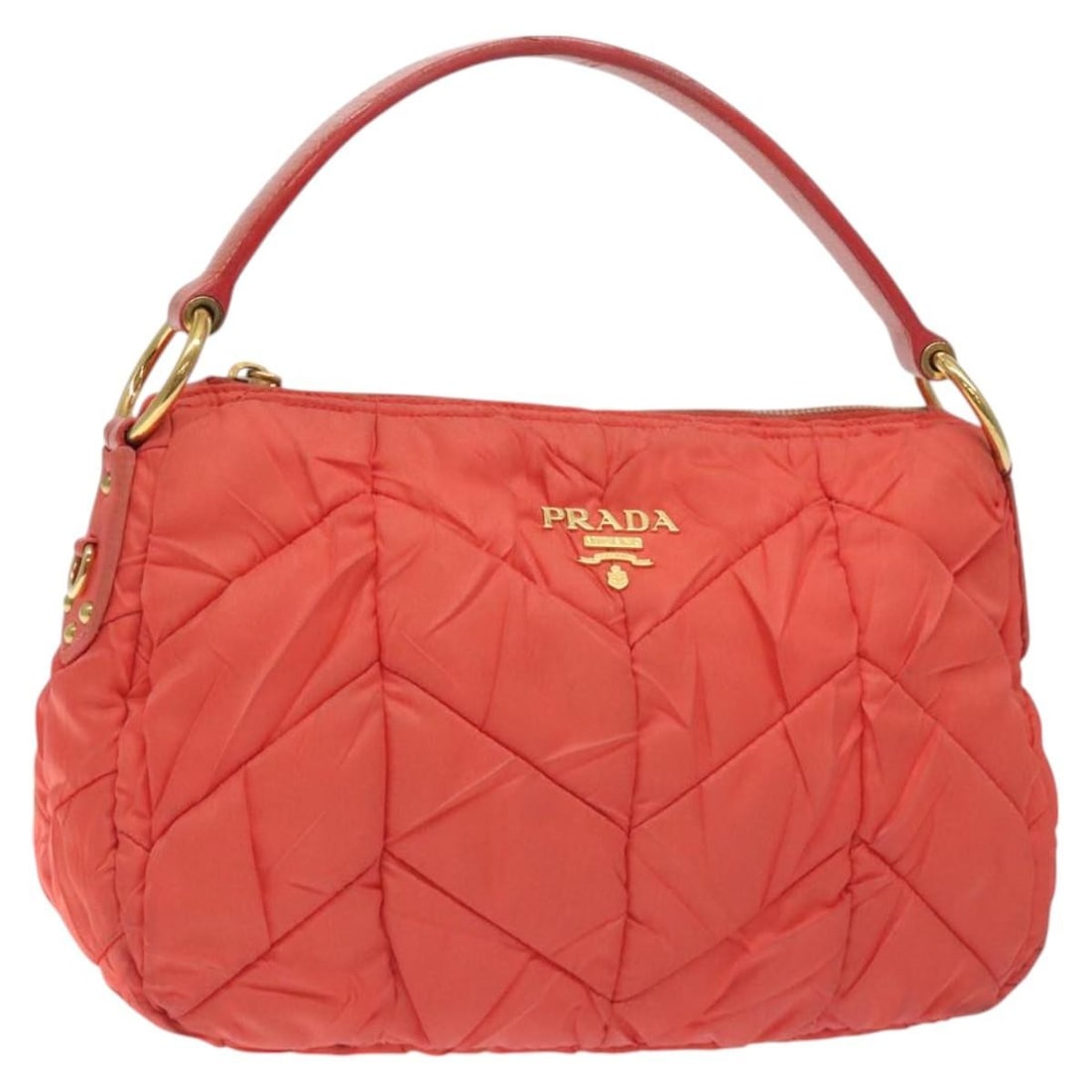 Orange Prada Handbag with Zipper Closure Vintage Style: Orange Prada Handbag with Zipper Closure Vintage Style This Prada vintage zip handbag features an orange exterior with signs of rubbing, staining, and a slightly lost shape. The handles show rubbing,