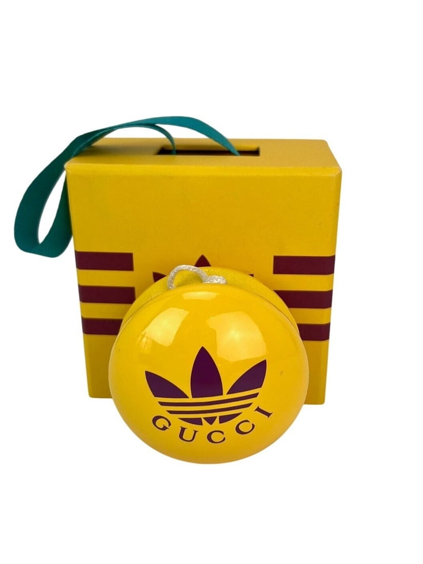 Gucci x Adidas Yellow Wood Yoyo 2022 Limited Edition Collectible: Gucci x Adidas Yellow Wood Yoyo 2022 Limited Edition Collectible This Gucci x Adidas Yellow Wood Yoyo is a unique collectible designed for enthusiasts of all ages, particularly those aged 17 and up. R