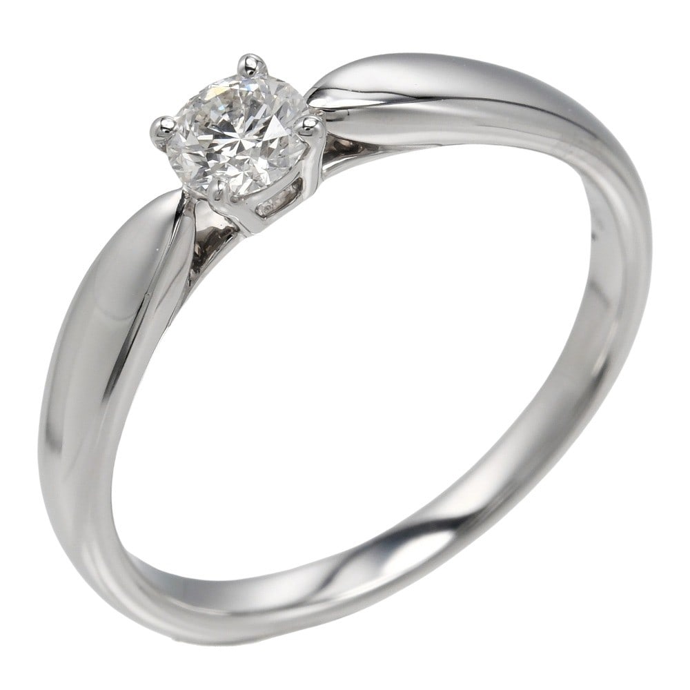 Harmony Solitaire Ring by Tiffany & Co.: Harmony Solitaire Ring by Tiffany & Co. This Tiffany & Co. Harmony Solitaire ring is designed for women and is in excellent condition, showing only minimal signs of previous use such as light scratche