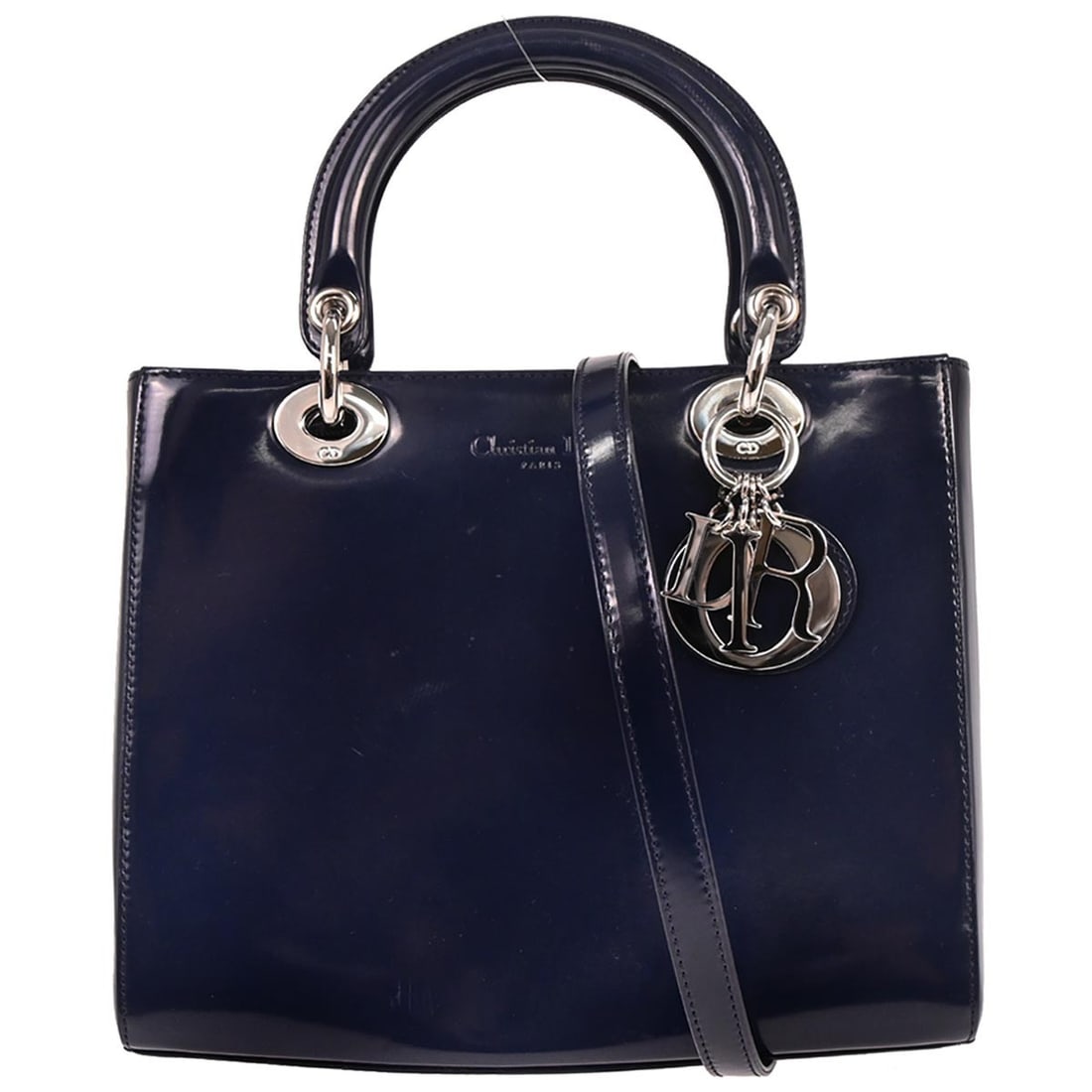 Navy Lady Dior Patent Leather Satchel with Double Handles and Strap: Navy Lady Dior Patent Leather Satchel with Double Handles and Strap This Christian Dior Lady Dior handbag is crafted from navy patent leather and features quilted accents. It offers both double handle