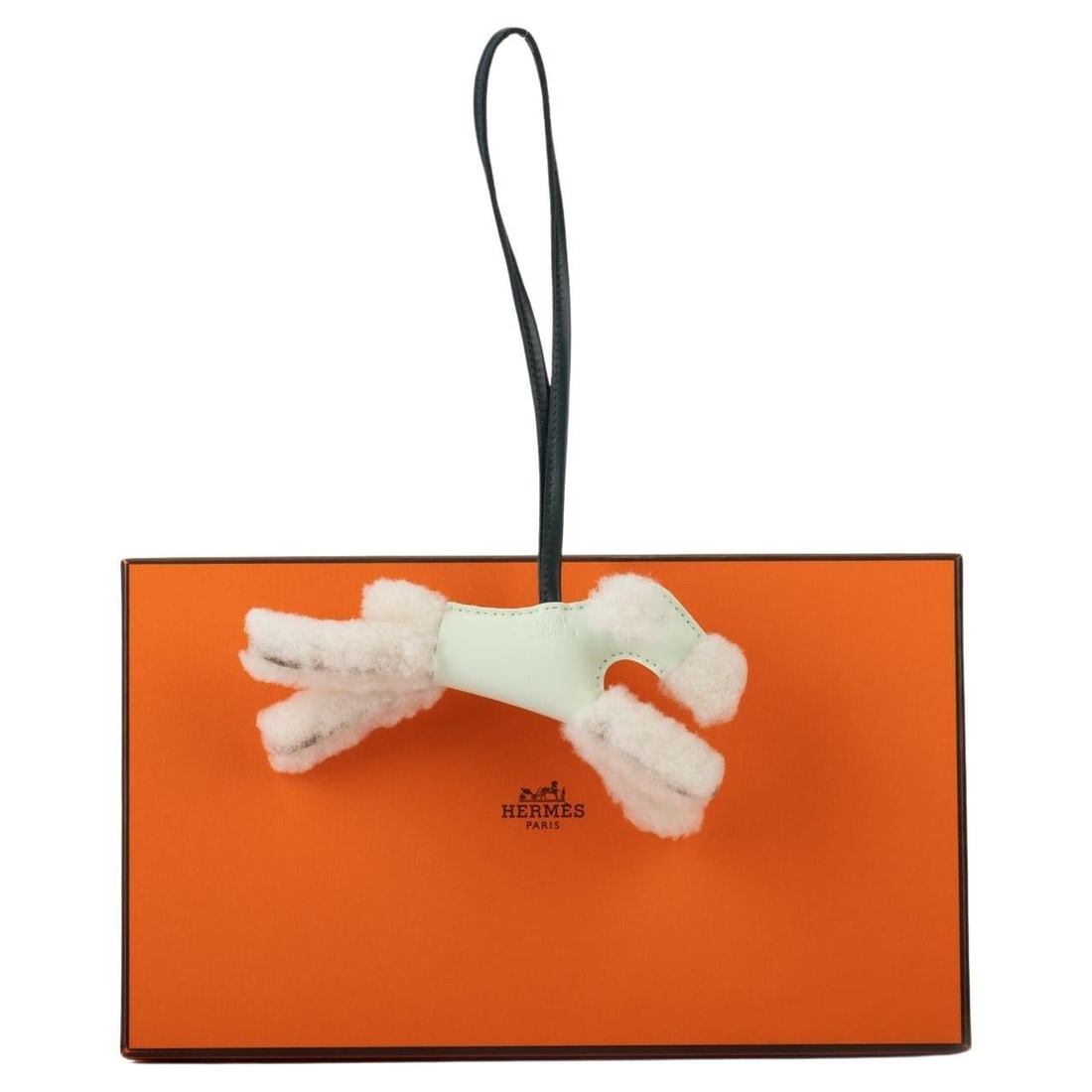 Hermes Green Shearling Dog Charm BNIB 2022 Luxury Accessory: Hermes Green Shearling Dog Charm BNIB 2022 Luxury Accessory This exquisite charm from Hermes captures the essence of luxury and playfulness. Crafted from green milo leather and shearling, this dog cha