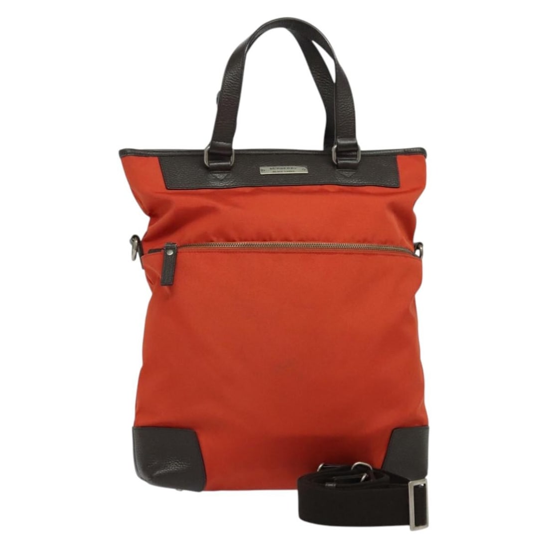 Red vintage Burberry tote bag with leather accents for women: Red vintage Burberry tote bag with leather accents for women This Burberry vintage tote bag features a red exterior with leather details and a classic tote silhouette. The bag shows signs of use, incl