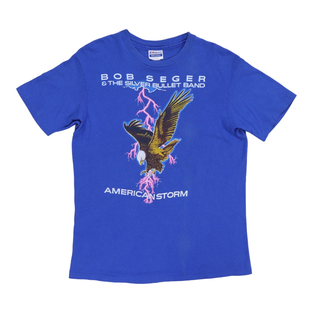 Vintage 1986 Bob Seger Tour Shirt Blue Graphics: Vintage 1986 Bob Seger Tour Shirt Blue Graphics Step back in time with this original vintage 1986 Bob Seger Tour Shirt. This authentic piece features striking front and back graphics, showcasing your