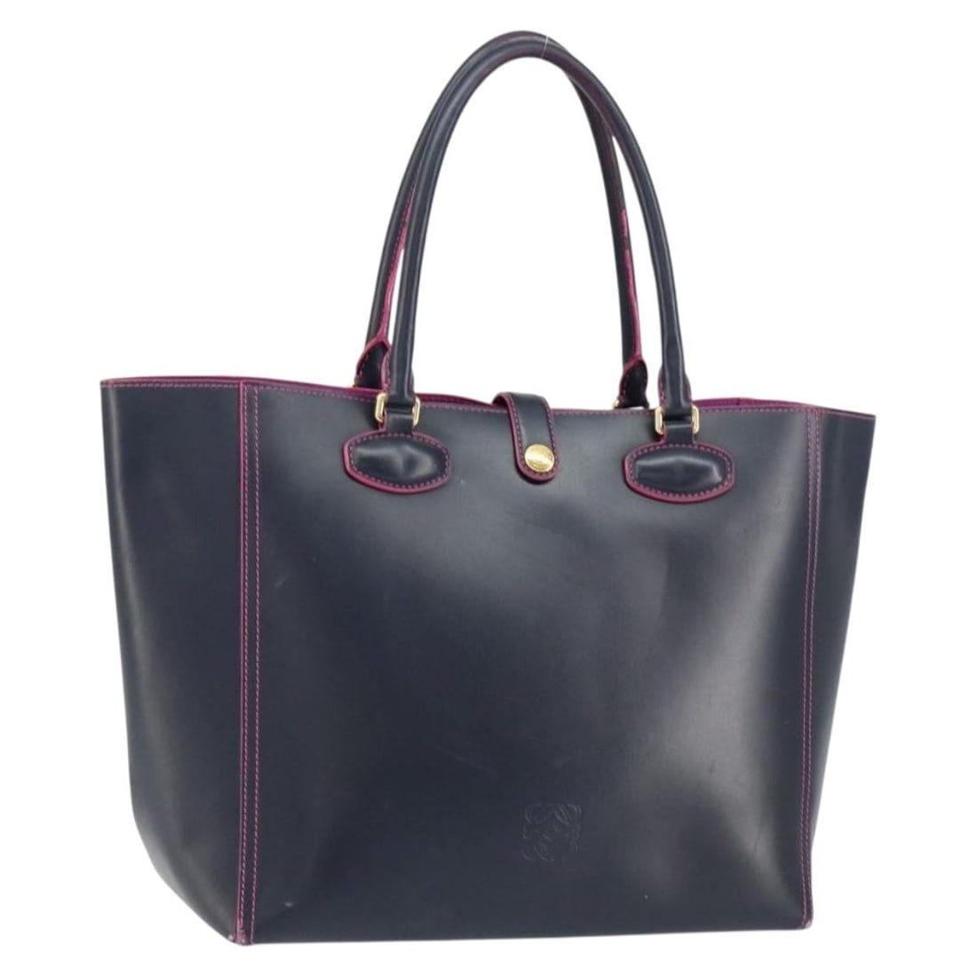 Navy Anagram Tote Bag by Loewe: Navy Anagram Tote Bag by Loewe This pre-owned Loewe Anagram Leo Shopper Tote in navy is a stylish and spacious tote bag designed for women. It features visible signs of use including surface rubbing,