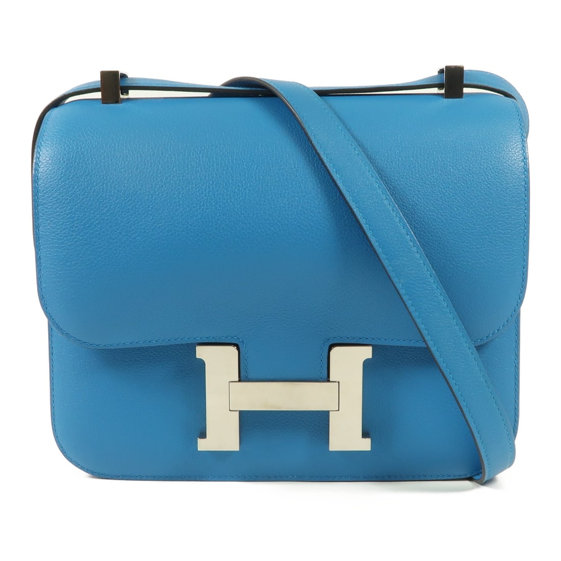 HERMES Constance 24 Shoulder Bag Evercolor Leather Blue Zanzibar: HERMES Constance 24 Shoulder Bag Evercolor Leather Blue Zanzibar Introducing the exquisite HERMES Constance 24 Shoulder Bag, crafted from premium Evercolor leather in a stunning Blue Zanzibar hue. Thi