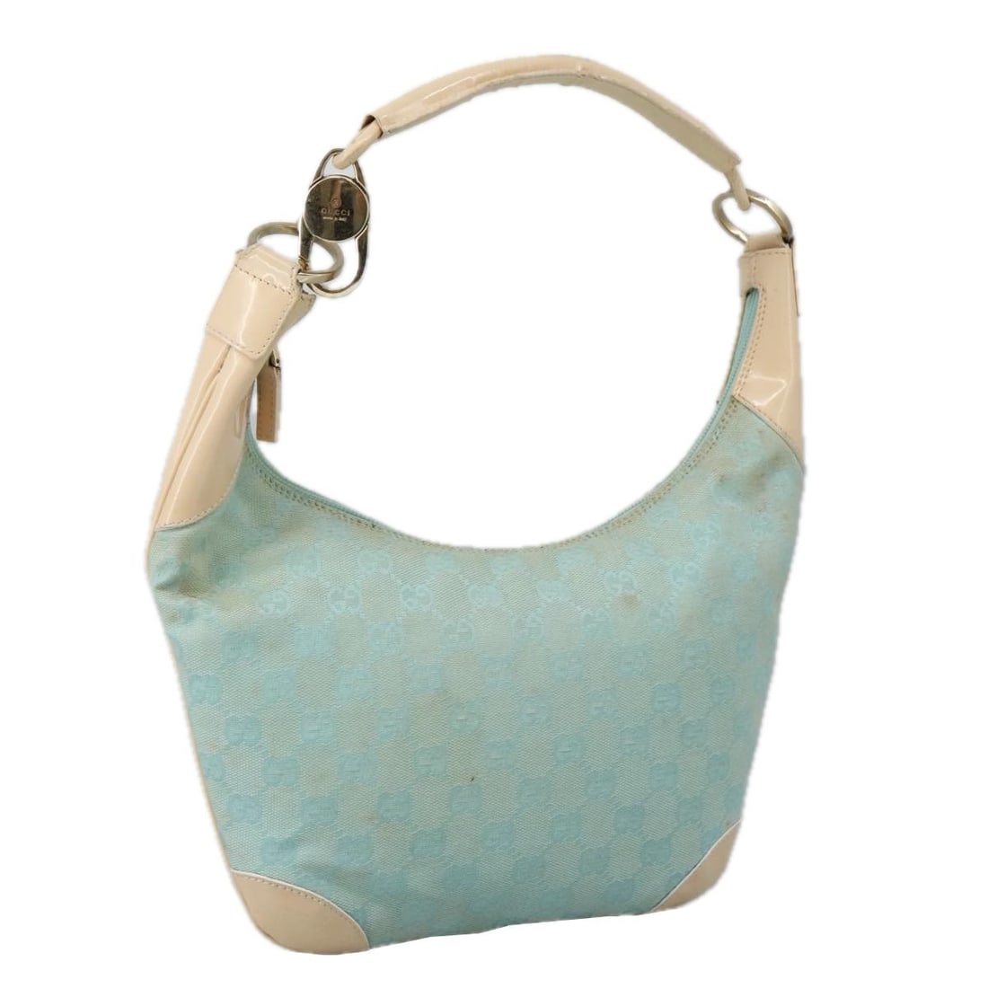 Vintage Blue Hobo Shoulder Bag by Gucci: Vintage Blue Hobo Shoulder Bag by Gucci This pre-owned Gucci vintage hobo shoulder bag features a blue exterior and is designed for women. The bag shows signs of wear, including rubbing and slight sta