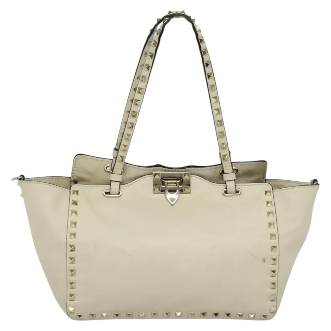 Rockstud White Tote Bag by Valentino Garavani: Rockstud White Tote Bag by Valentino Garavani This Valentino Garavani Rockstud Tote in white is a stylish bag designed for women. It features signature Rockstud detailing and offers both handles and a