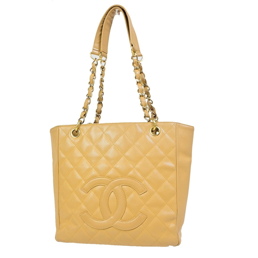 Beige Chanel Petite Shopping Tote Bag: Beige Chanel Petite Shopping Tote Bag This is a Chanel Petite Shopping Tote in beige, designed for women. The bag shows signs of wear, including frayed corners, scuffs, dirt, wrinkles, stains, scratch