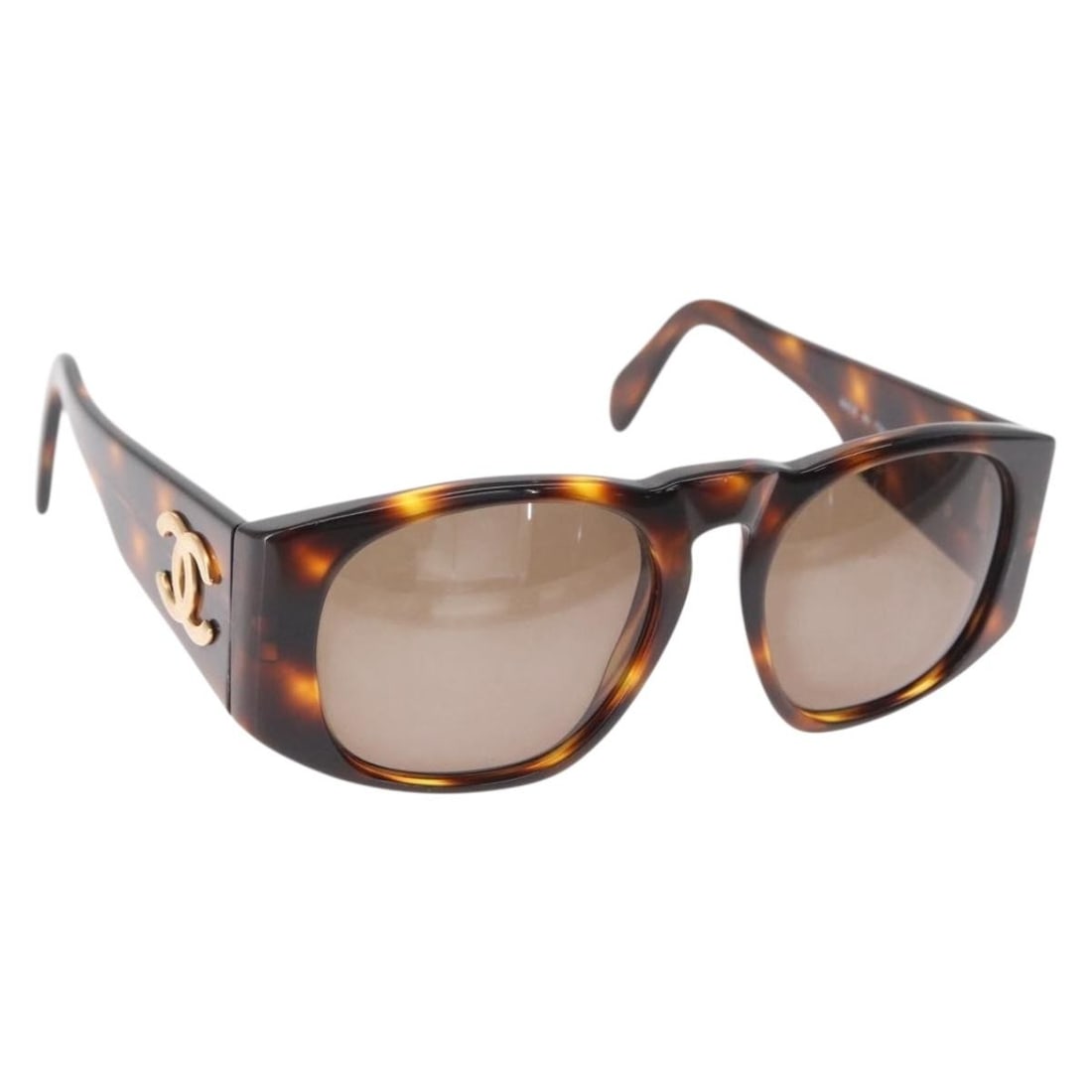 Brown Logo Sunglasses by Chanel for Women: Brown Logo Sunglasses by Chanel for Women This pre-owned pair of CHANEL sunglasses features a brown design with the iconic CHANEL logo. The sunglasses are intended for women and remain in good conditi