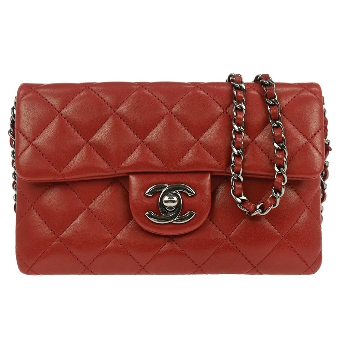 Chanel Classic Flap Mini Red Lambskin Leather Crossbody Shoulder Bag: Chanel Classic Flap Mini Red Lambskin Leather Crossbody Shoulder Bag This Chanel Classic Flap bag features luxurious red lambskin leather in a mini size. Designed as a shoulder bag, it comes with a cr