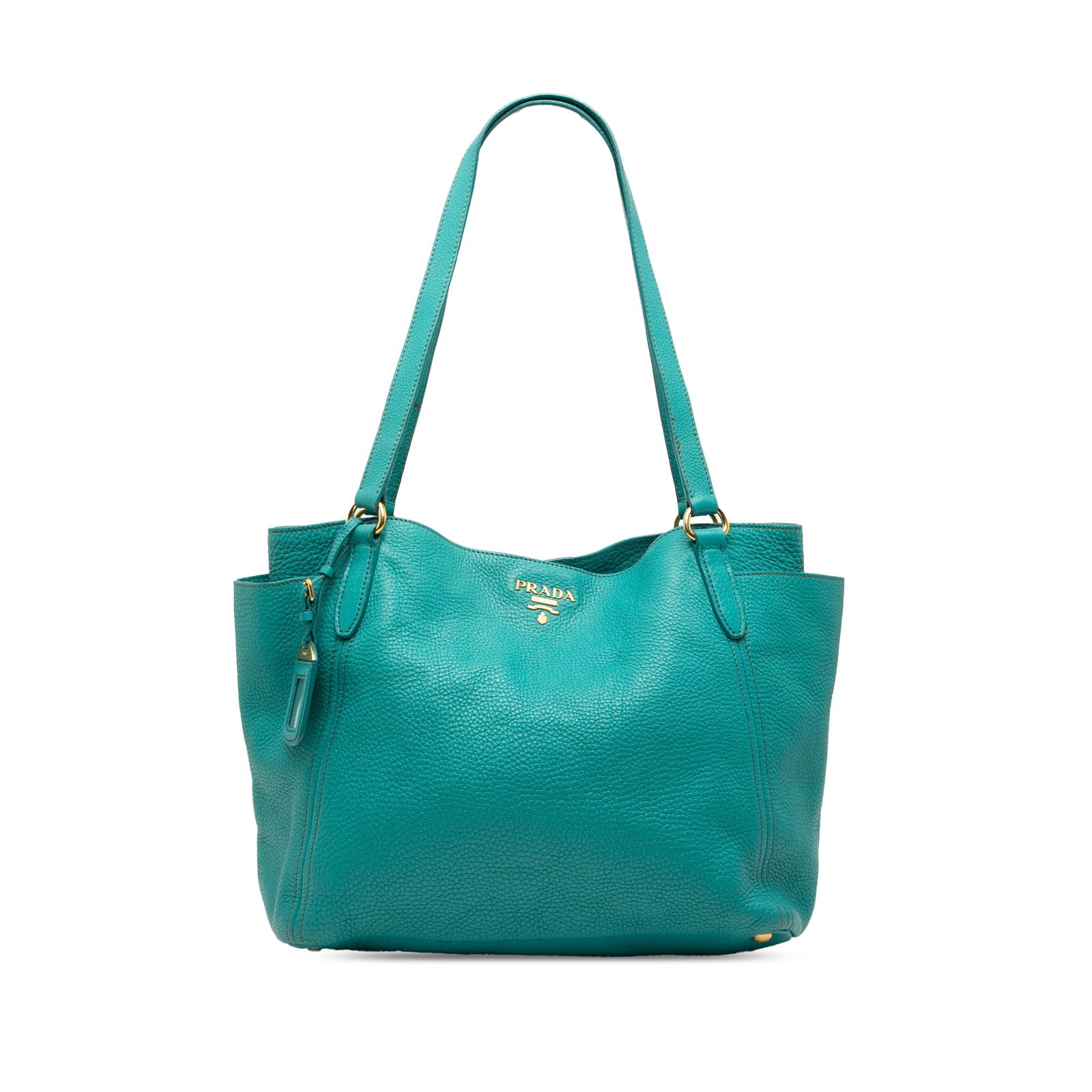 Prada Vitello Daino Blue Leather Side Pocket Tote Bag: Prada Vitello Daino Blue Leather Side Pocket Tote Bag This Prada Vitello Daino Side Pocket Tote is a stylish and functional accessory crafted from premium leather. It features a spacious open top secu