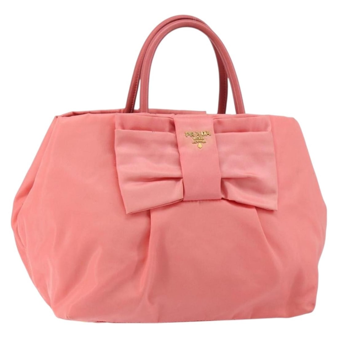 Pink Prada Tote Bag with Bow and Logo Detail: Pink Prada Tote Bag with Bow and Logo Detail This pre-owned Prada tote bag features a logo bow design in pink. It is in good condition with visible signs of wear, including rubbing and slight stains o