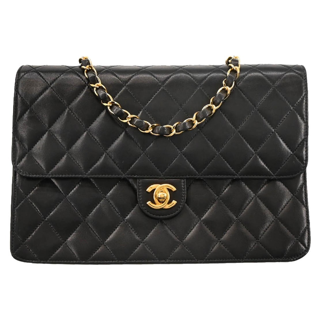 Chanel Classic Medium Black Lambskin Half Flap Shoulder Bag: Chanel Classic Medium Black Lambskin Half Flap Shoulder Bag This elegant Chanel Medium Half Flap Shoulder Bag is crafted from luxurious black lambskin. The classic design features a turn lock closure