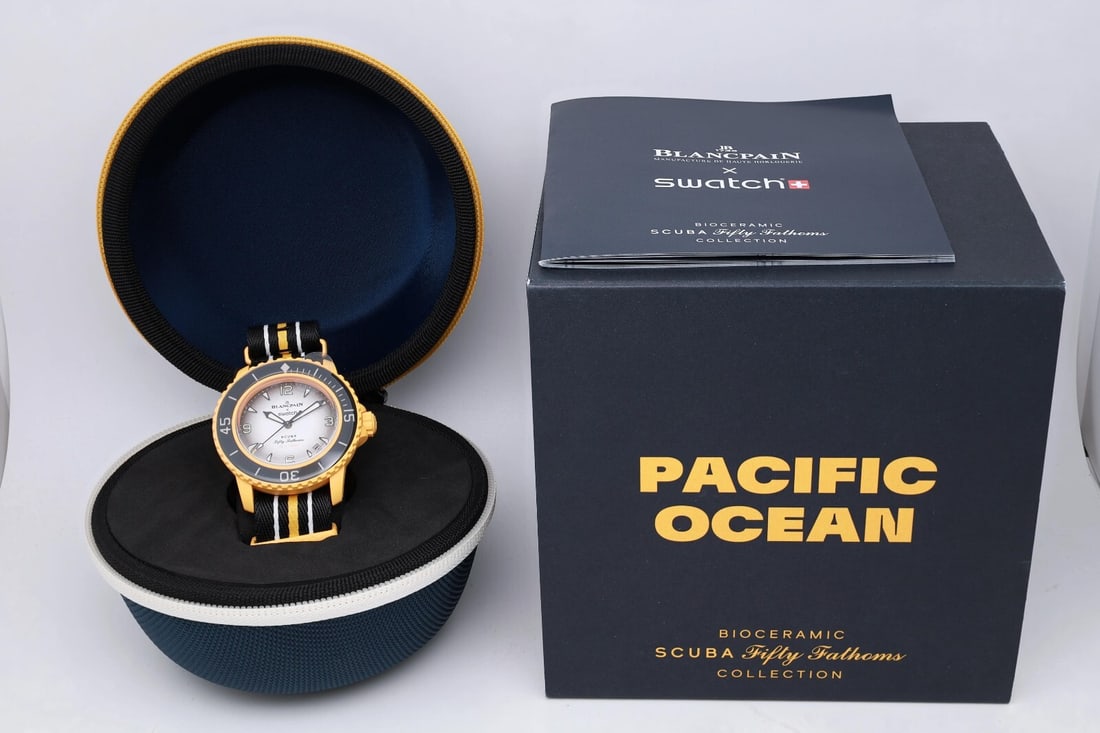 Blancpain x Swatch Scuba Fifty Fathoms Gray Dial Automatic Watch: Blancpain x Swatch Scuba Fifty Fathoms Gray Dial Automatic Watch Experience the unique blend of style and functionality with the Blancpain x Swatch Scuba Fifty Fathoms Pacific Ocean Gray Dial Watch. T