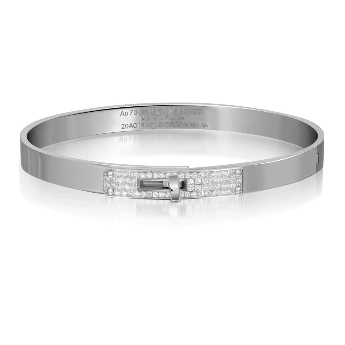 Hermes Kelly 18K White Gold Bangle Bracelet with 0.36 Carat Diamonds: Hermes Kelly 18K White Gold Bangle Bracelet with 0.36 Carat Diamonds This exquisite Hermes Kelly bangle bracelet is a stunning piece made from 18K white gold. It features a sophisticated turn clasp ad