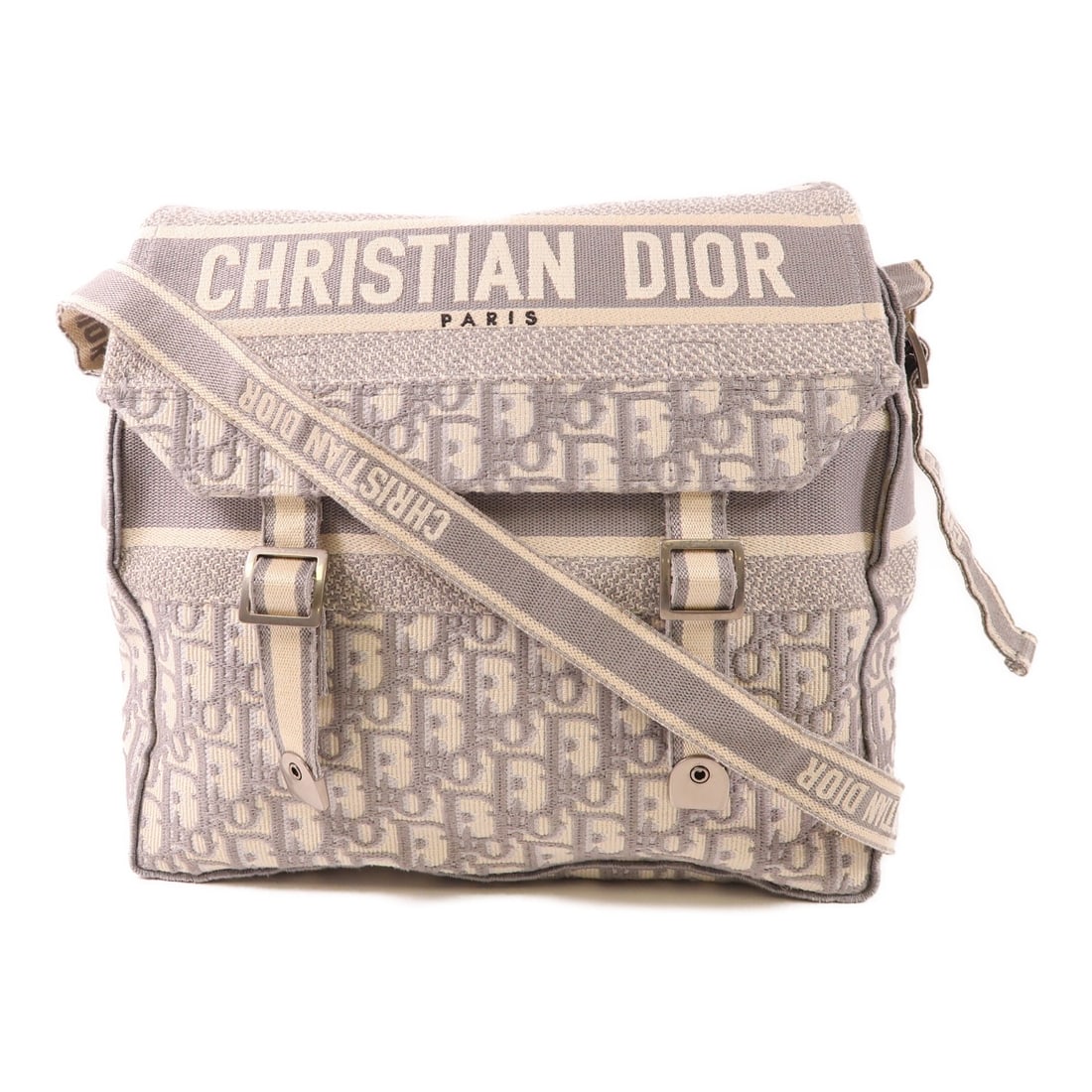 Christian Dior Diorcamp Shoulder Bag Canvas Grey Beige: Christian Dior Diorcamp Shoulder Bag Canvas Grey Beige The Christian Dior Diorcamp Shoulder Bag is a stylish accessory crafted from durable canvas in a sophisticated gray and beige color scheme. This