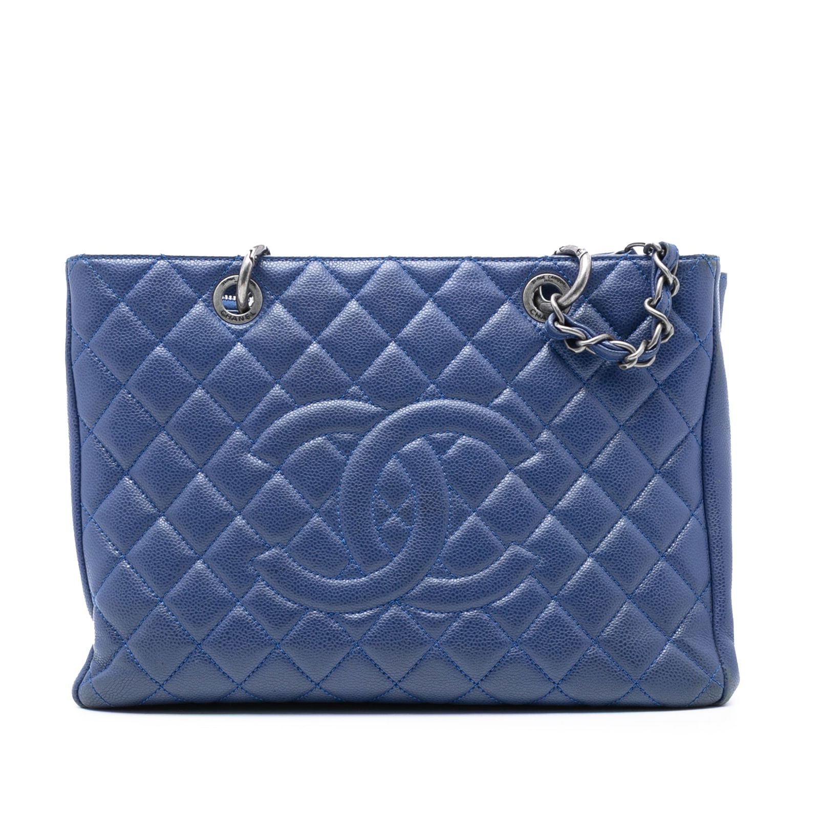 Chanel Blue Caviar Leather Grand Shopping Tote Bag with Chain Straps: Chanel Blue Caviar Leather Grand Shopping Tote Bag with Chain Straps This Chanel Grand Shopping Tote features a blue caviar leather body with curb chain straps and an open top. The bag includes an ext